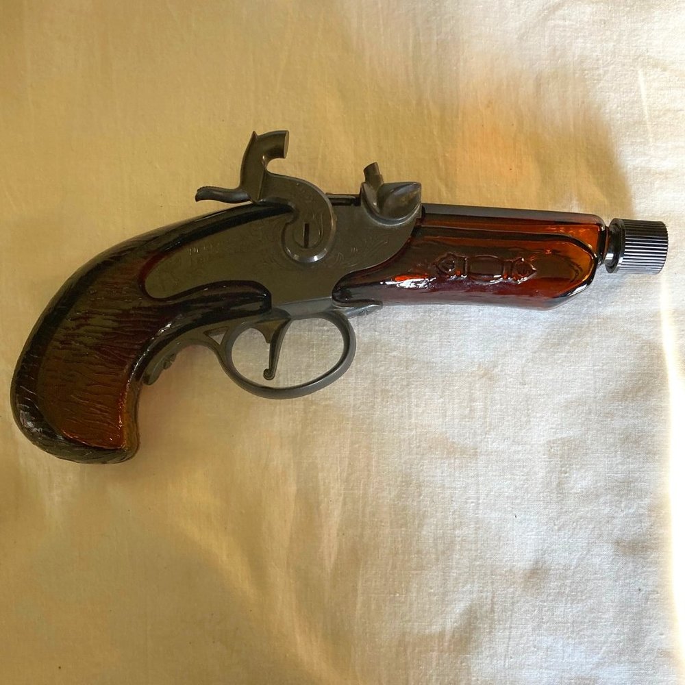 Avon pistol cologne bottle